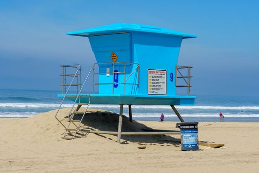 Lifeguard tower on the Huntington Beach during sunny day. Southeast Los Angeles, California. USA,