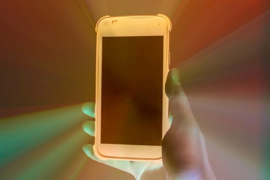 3D-Illustration of a female hand holding a smartphone with kirlian glow