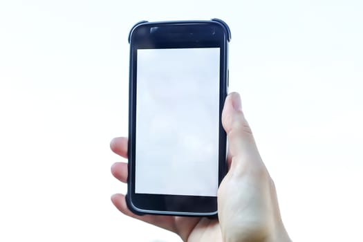 Isolated female hand holding a smartphone on a white background