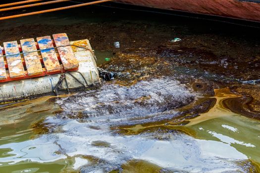 Ecological catastrophy. Spill of oil products into the sea.