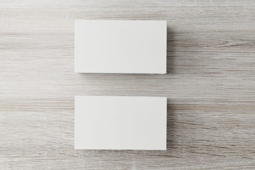 Mockup of two horizontal business cards at white textured background.