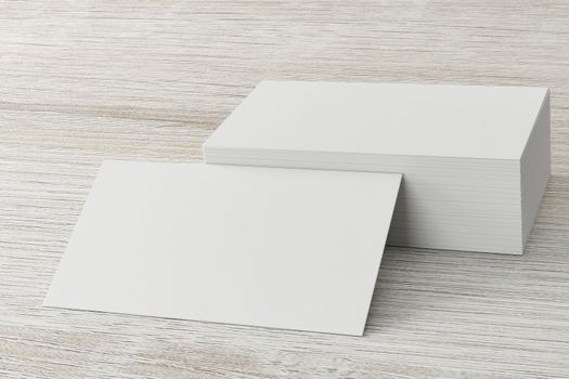 Mockup of two horizontal business cards at white textured background.