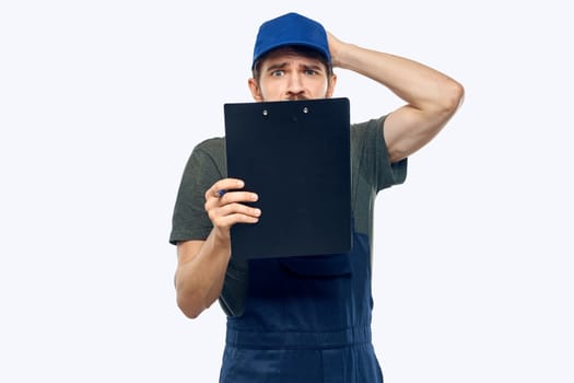 Man in working form documents loading worker service lifestyle. High quality photo