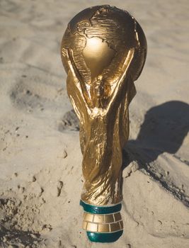 May 30, 2019. Doha, Qatar. Copy FIFA World Cup trophy on sand. FIFA World Cup  2022  will be held in Qatar.