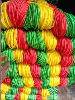multiple colored nylon yarn background on shop