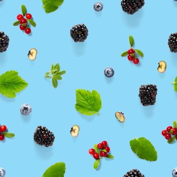 Creative seamless pattern of wild berries, blackberry, blueberry, lingonberry and bramble. modern seamless pattern on blue backgriund made from autumn forest wild berries. Forest berries mix