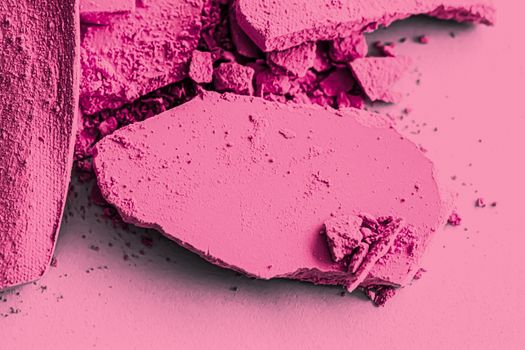 Pink eye shadow powder as makeup palette closeup, crushed cosmetics and beauty textures