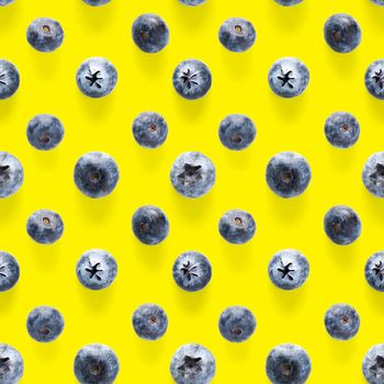 Trendy seamless pattern of blueberries. Blueberry pattern isolated on yellow background. Blueberry flat lay, can be used for textile, prints, packing designs orother moden andcreative works