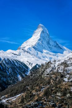 Beautiful view of old village with Matterhorn peak background in Zermatt, Switzerland.