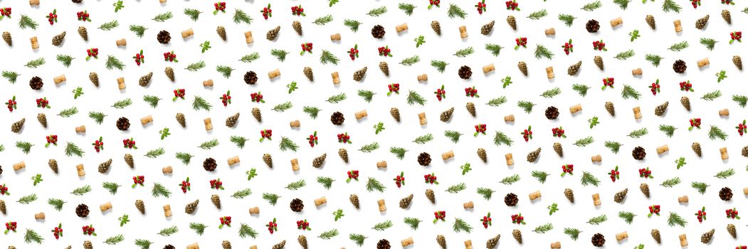 christmas background with pine cone, wine cork, pine twig and lingonberry. christmas background on white backdrop