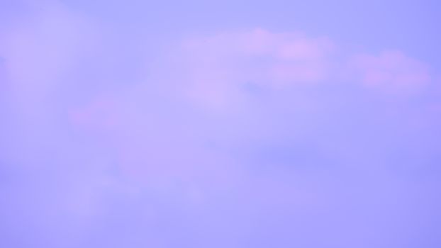 Abstract cloud on the sky with purple blurred background