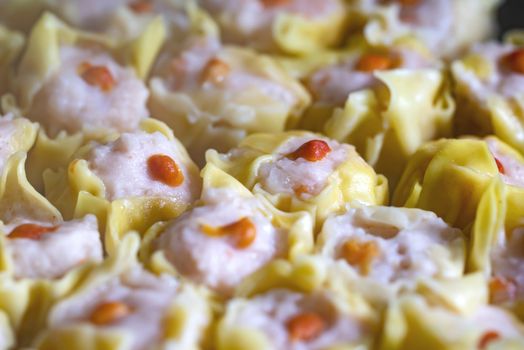 Shumai is a type of traditional Chinese dumpling, originating from Hohhot. In Cantonese cuisine, it is usually served as a dim sum snack. In addition to accompanying the Chinese diaspora, a variation of shaomai also appears in Japan and various southeast