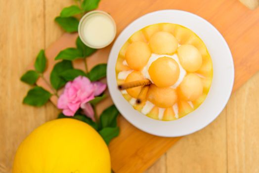 Melon Bingsoo with Sweetened Condensed Milk on wood table