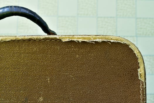 corner of the top of an old suitcase, background