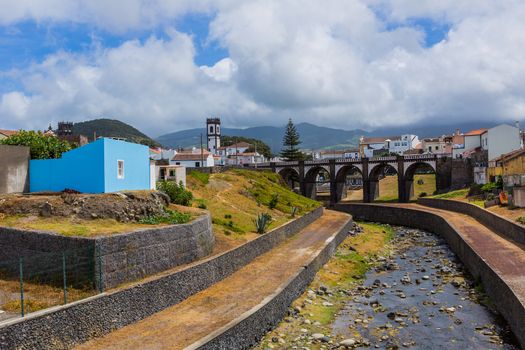 View of the bridge and church tower in Ribeira Grande town, Sao Miguel island, Azores, Portugal.