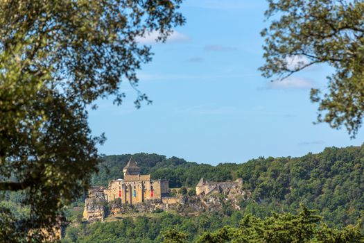 Castelnaud, France - August 16, 2019: view on medieval fortress Castelnaud Castle (Chateau de Castelnaud) in Dordogne valley, Perigord Noir region, Aquitaine, France
