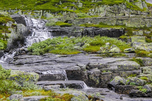 Hydnefossen waterfall and Hydna river on Veslehødn Veslehorn mountain in Hemsedal, Norway.