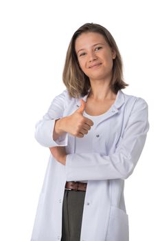 Portrait of female medical doctor showing thumb up and smiling isolated on white background