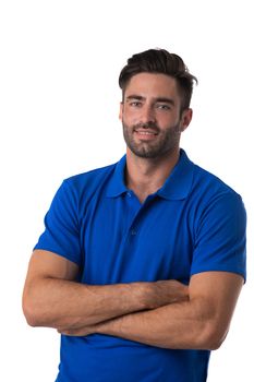 Portrait of healthy handsome model man in casual outfit posing with folded arms isolated on white background