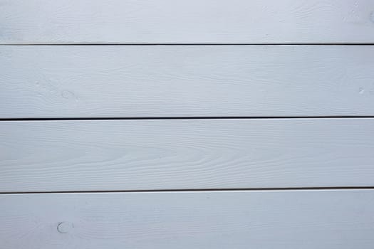 white wood texture background. .Old ragged painted fence