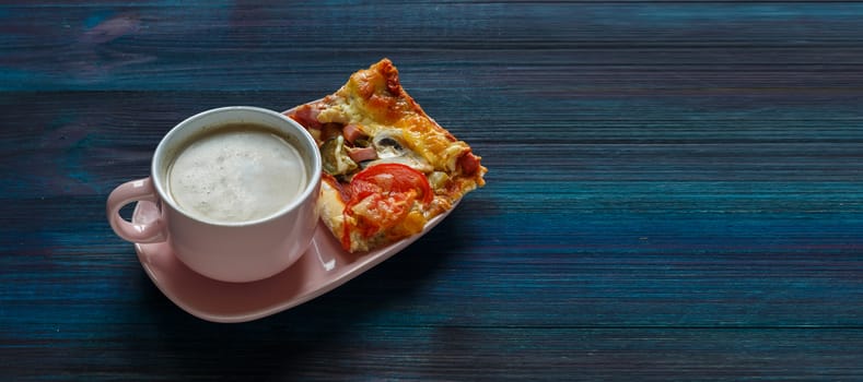 Homemade thin-crust pizza with tomatoes, mushrooms and pickled cucumbers with parmesan and cup of coffee on a dark wooden background