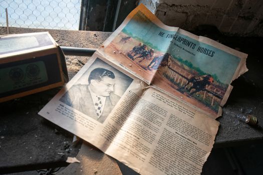 NEWARK, NEW JERSEY - JULY 17th, 2020: An Old Newspaper Sits Forgotten in the Abandoned Proctor's Palace Theatre in Newark New Jersey