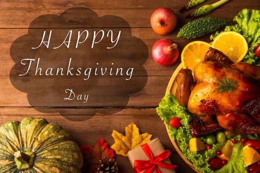 Thanksgiving roasted turkey or chicken and vegetables, Top view Christmas dinner feast food decoration traditional homemade on wooden table background, Happy thanksgiving day of holiday concept