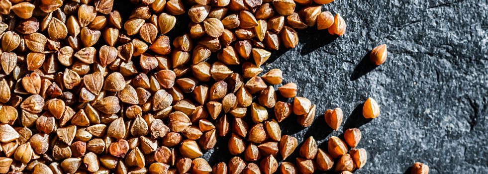 Buckwheat grain closeup, food texture and cook book backgrounds