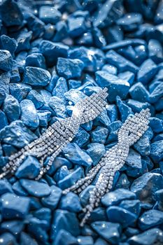 Luxury diamond earrings closeup, jewelry and fashion brands