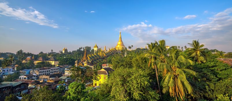 Yangon skyline with Shwedagon Pagoda in Myanmar with beautiful  blue sky