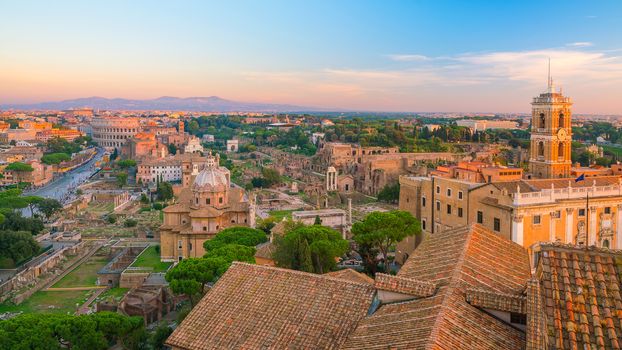 Top view of  Rome city skyline with Colosseum and Roman Forum in Italy.