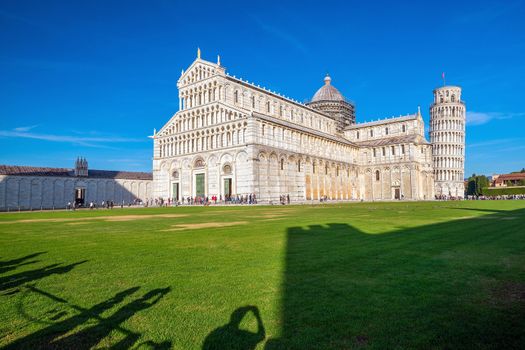 Pisa Cathedral and the Leaning Tower in a sunny day in Pisa, Italy.