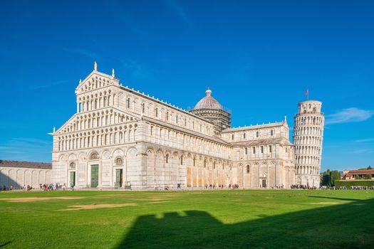 Pisa Cathedral and the Leaning Tower in a sunny day in Pisa, Italy.