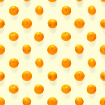 Fresh mandarin Seamles pattern. Ripe fruit tangerines seamless pattern. Fresh citrus isolated on yellow background pattern. Flat lay of Clementine. Mandarine modern tropical seamless background.