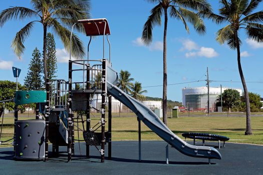 Slippery slide and play equipment in childrens outdoor playground, no-one to play