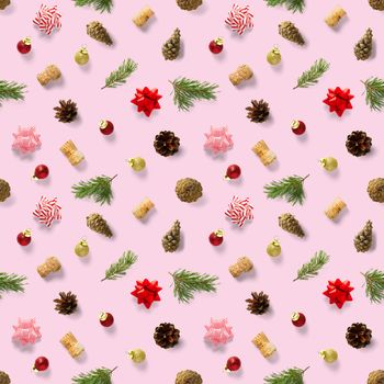 Seamless regular creative Christmas pattern with New Year decorations on pink background. xmas Modern Seamless pattern made from christmas decorations. Photo quality pattern for fabric, prints, wallpapers, banners or creative design works.