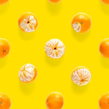 Fresh mandarin Seamles pattern. Ripe fruit tangerines seamless pattern. Fresh citrus isolated on yellow background pattern. Flat lay of Clementine. Mandarine modern tropical seamless background.