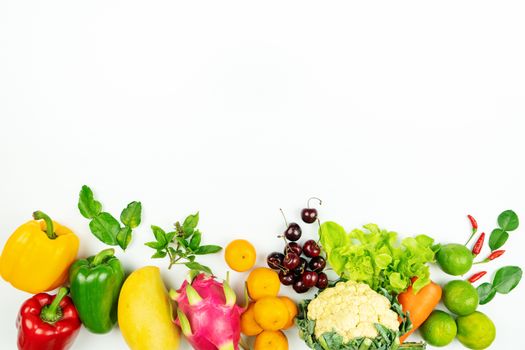 Fresh fruit and vegetable. Flat lay of fresh raw organic vegetables on white background