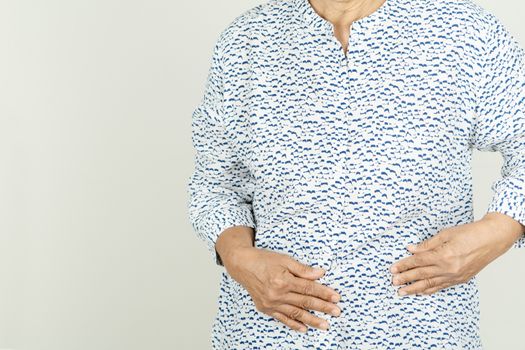 Senior woman painful stomachache at home,Female suffering from abdominal pain