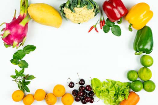 Fresh fruit and vegetable. Frame of fresh raw organic vegetables on white background