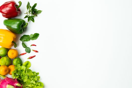 Fresh fruit and vegetable. Flat lay of fresh raw organic vegetables on white background