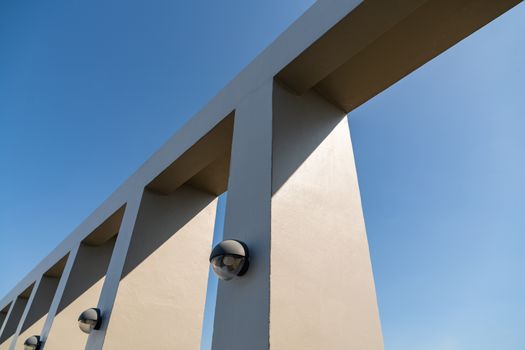 Exterior pole and light lamp on blue sky