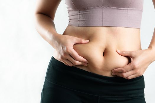 fat woman, fat belly, chubby, obese woman hand holding excessive belly fat, woman diet lifestyle concept