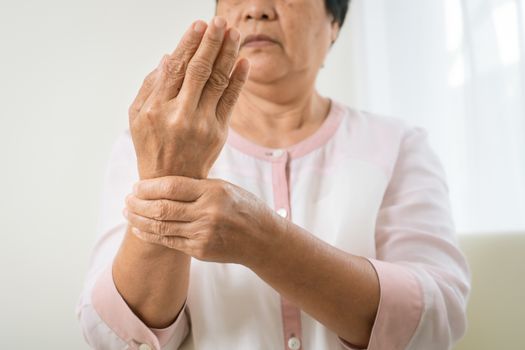 wrist hand pain of old woman, healthcare problem of senior concept