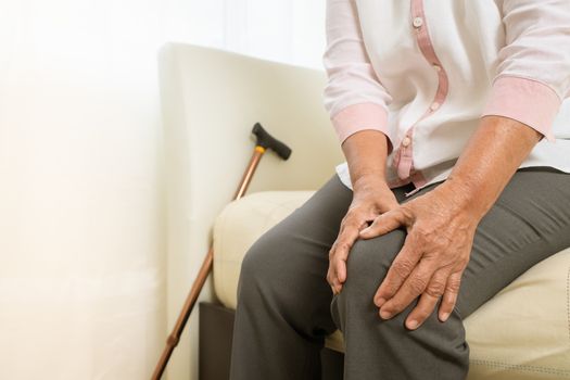 Knee pain of old woman at home, healthcare problem of senior concept