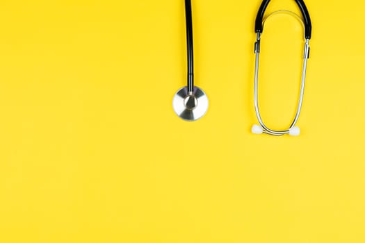 World health day concept, stethoscope on yellow background