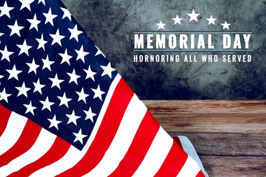 Memorial Day with American flag on wooden background