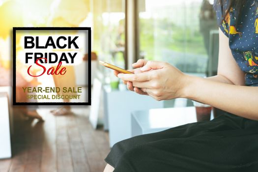 Black Friday Sale, woman hand online shopping on smartphone