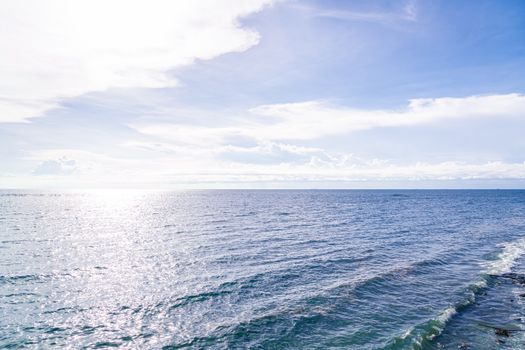 beautiful clouds over meet the blue sea