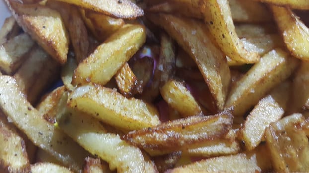 Potato fried or roasted slices on clean background with copy space for text